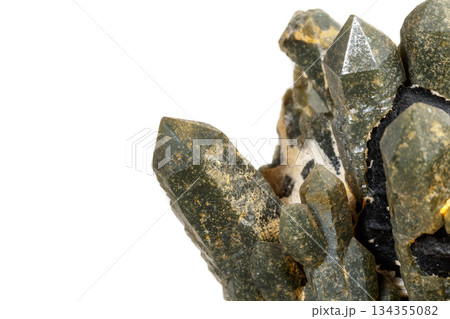 Macro mineral stone Quartz Hedenbergite Prase on ilvite on a white background Macro mineral stone Quartz Hedenbergite Prase on ilvite on a white background 134355082