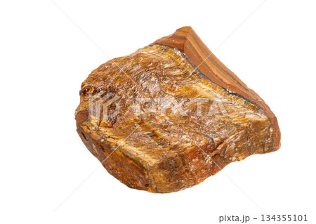 Macro mineral stone Tiger's eye in the breed on a white background Macro mineral stone Tiger's eye in the breed on a white background 134355101