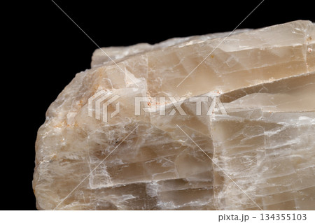 Macro mineral stone Moonstone a black background Macro mineral stone Moonstone a black background 134355103