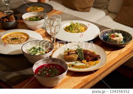 Indulge in an Elegant Dining Experience Featuring a Variety of Exquisite Global Dishes 134356352