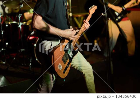 Guitar Technique Shown, Intimate Image Emphasizing Guitar Fingering And Rhythm In Performance 134356430