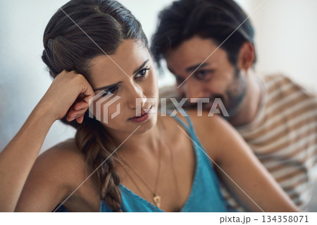 Conflict, upset or sad with a couple arguing on a sofa in their home living room about an affair or breakup. Depression, unhappy or domestic violence with a woman thinking about divorce after a fight Conflict, upset or sad with a couple arguing on a sofa in their home living room about an affair or breakup. Depression, unhappy or domestic violence with a woman thinking about divorce after a fight 134358071