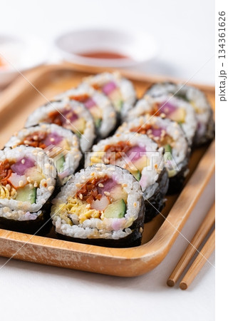 Kimbap, Korean food made from cooked rice with vegetables, egg and wrapped with dried seaweed Kimbap, Korean food made from cooked rice with vegetables, egg and wrapped with dried seaweed 134361626