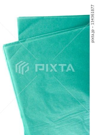 Turquoise tissue wrapping sheets for flowers stacked neatly isolated on white background used for bouquet decoration floral packaging and gift wrapping Turquoise tissue wrapping sheets for flowers stacked neatly isolated on white background used for bouquet decoration floral packaging and gift wrapping 134361877