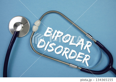 Bipolar Disorders text with Stethoscope on blue background Bipolar Disorders text with Stethoscope on blue background 134365155
