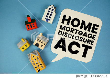 HMDA Home Mortgage Disclosure Act text with house models on blue background 134365323