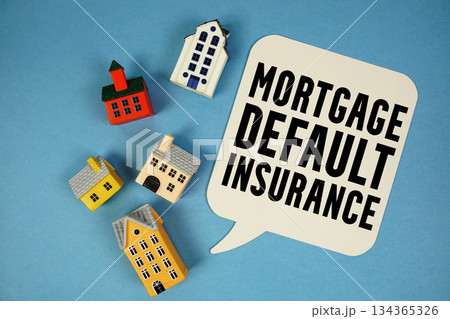 Mortgage Default Insurance text with house models on blue background Mortgage Default Insurance text with house models on blue background 134365326