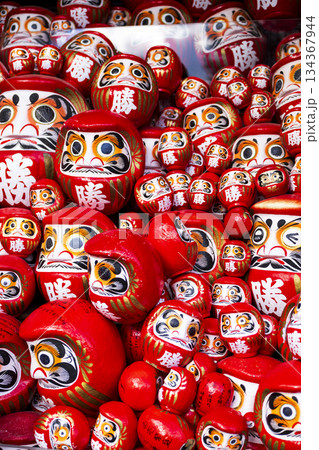DARUMA dollss with Japaness word, which means victory, in Kachioji Temple Osaka Japan DARUMA dollss with Japaness word, which means victory, in Kachioji Temple Osaka Japan 134367944