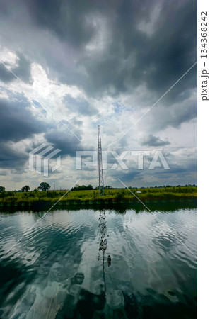 Symmetrical coastal view emphasizing mood and atmospheric elements 134368242