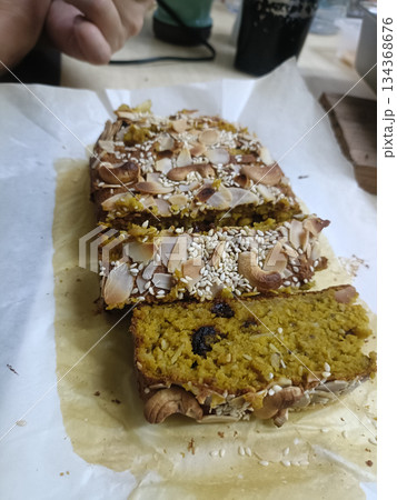 Pumpkin bread nutty homemade sliced sesame almond rustic cozy delight with crunchy topping Pumpkin bread nutty homemade sliced sesame almond rustic cozy delight with crunchy topping 134368676