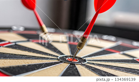 two red darts hitting bullseye center of dartboard precision focus accuracy success objective goal achievement concept two red darts hitting bullseye center of dartboard precision focus accuracy success objective goal achievement concept 134369139