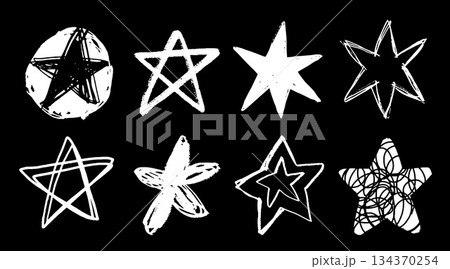 Set of white doodle style stars drawn by hand. Grunge scrawls, chalk scribbles, rough brush strokes, underlines. Bold charcoal freehand stars. Crayon or marker scribbles 134370254