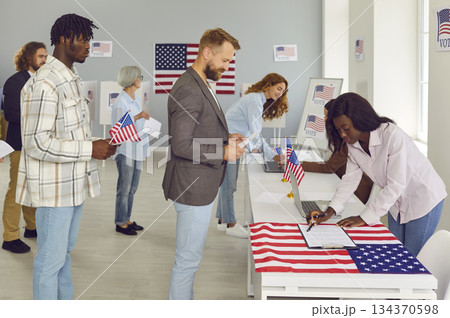 Diverse US citizens come to the polling station during the presidential elections Diverse US citizens come to the polling station during the presidential elections 134370598