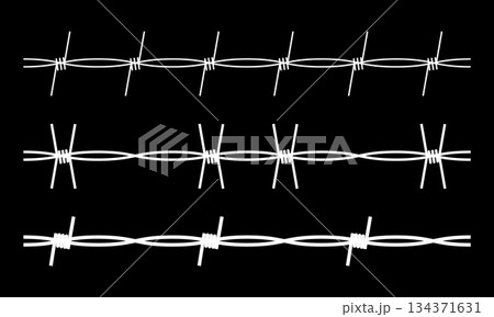 Metal wire with barbs and spikes set for steel border, prison fence and military barrier. 134371631