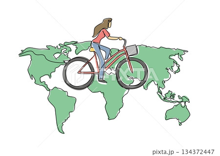 One line drawing of a young beautiful woman cycling on a world map, nature concept, eco-friendly theme for World Bicycle Day, minimalist style promoting sustainable travel worldwide campaign. One line drawing of a young beautiful woman cycling on a world map, nature concept, eco-friendly theme for World Bicycle Day, minimalist style promoting sustainable travel worldwide campaign. 134372447