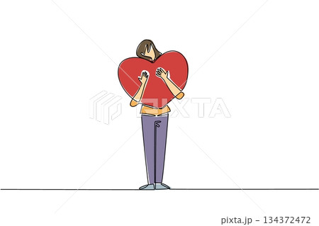 A single line drawing of a woman holding a large heart tightly against her chest, representing connection, tenderness, and unity for Love Conquers All Day in a relationship and affection concept. 134372472