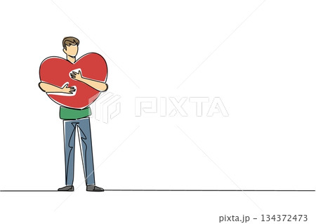 A continuous line drawing of a young man warmly embracing a giant heart against his chest, conveying protection and devotion for Love Conquers All Day in a relationship and compassion concept. 134372473