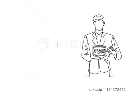 A one line drawing of a male dentist demonstrating tooth brushing on a dental model, symbolizing oral hygiene education for National I Love My Dentist Day in a health concept. 134372482
