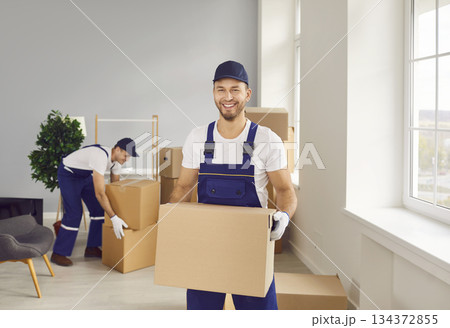 Portrait of Smiling Man with Box During Office or Home Relocation 134372855