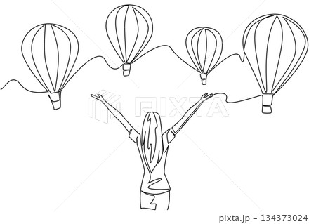 Continuous line draw of woman raising hands to hot air balloons celebrates freedom and travel concept in Hot Air Balloon Day, symbolizing joy, adventure, and international celebration of exploration 134373024