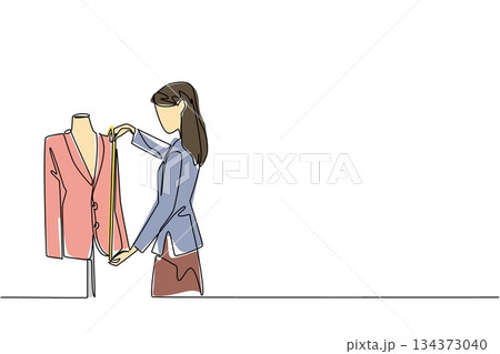 A woman tailor measures blazer on mannequin using tape in single line drawing style, showcasing tailoring business concept, skilled garment craft, and honoring artisans for National Tailors Day. A woman tailor measures blazer on mannequin using tape in single line drawing style, showcasing tailoring business concept, skilled garment craft, and honoring artisans for National Tailors Day. 134373040