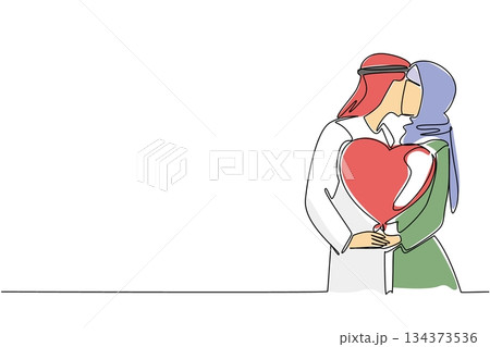 Continuous line drawing of an romantic young Arab couple kissing passionately while holding a red heart shaped balloon, symbolizing cultural love, romance, and shared joy. National Loving Day event 134373536