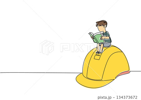 One line drawing of boy reading a book sitting on a large yellow hard hat. Industry concept of international event World Day Against Child Labor prevention initiative and promote schooling and safety 134373672