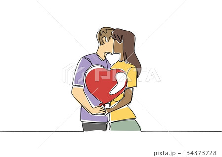 Single line draw of diverse couple kissing passionately while holding red heart shaped balloon, showing love, romance, joy. National Loving Day celebrate freedom to love and marry across line of race Single line draw of diverse couple kissing passionately while holding red heart shaped balloon, showing love, romance, joy. National Loving Day celebrate freedom to love and marry across line of race 134373728