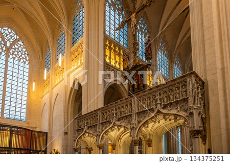 Gothic rood screen and crucifix inside Saint Peters Church in Leuven 134375251