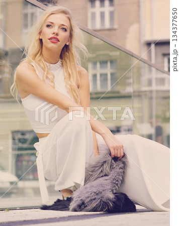 Woman wearing crop top and culottes 134377650