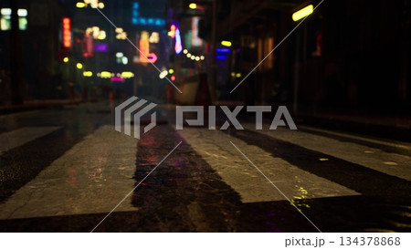 Raindrops glisten on a deserted city street where vibrant neon lights reflect off wet pavement. The atmosphere is lively, inviting curiosity and exploration into the night. Raindrops glisten on a deserted city street where vibrant neon lights reflect off wet pavement. The atmosphere is lively, inviting curiosity and exploration into the night. 134378868