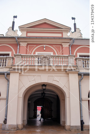 Historic building entrance with archway and balcony in Lublin, Poland 134379459
