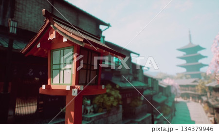 A vibrant red lantern stands in the foreground, illuminating a serene path. Traditional wooden buildings and cherry blossoms frame the scene, showcasing the beauty of Japan in spring. 134379946
