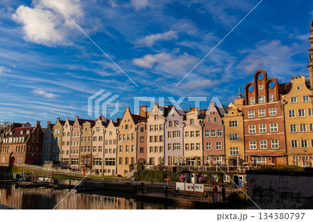 Colorful buildings along the canal in Gdansk, Poland on a sunny day 134380797