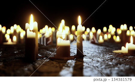 Flickering candles cast a gentle light in a darkened room, creating a peaceful ambiance. Their soft glow dances on nearby surfaces, inviting tranquility and reflection. Flickering candles cast a gentle light in a darkened room, creating a peaceful ambiance. Their soft glow dances on nearby surfaces, inviting tranquility and reflection. 134381579