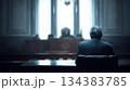 Legal Proceedings: Man in Courtroom Awaiting Justice 134383785