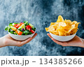 Unhealthy vs healthy food. vegetable salad and potato in different hands on green background . Choice between fast foods and vegetables, fruit. 134385266
