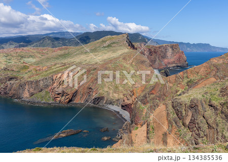 Narrow isthmus of Ponta de Sao Lourenco Madeira with rugged volcanic cliffs and slopes 134385536
