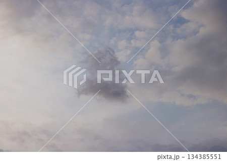 Cloudy Sky with a Distinct Dark Cloud. nature background. scenic cloudy sky. High quality photo 134385551
