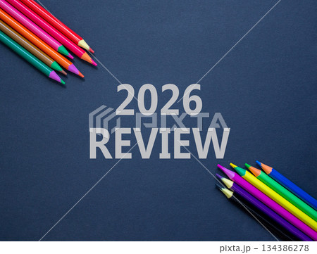 2026 Review symbol. Concept words 2026 Review on beautiful black paper. Beautiful black paper background. Beautiful colored pencils. Business and 2026 review concept. Copy space. 2026 Review symbol. Concept words 2026 Review on beautiful black paper. Beautiful black paper background. Beautiful colored pencils. Business and 2026 review concept. Copy space. 134386278