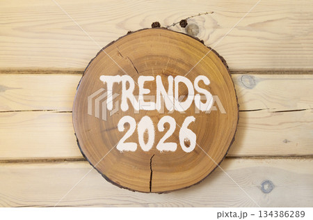 Trends 2026 new year symbol. Concept words Trends 2026 on beautiful wooden circle. Beautiful wooden wall background. Business and Trends 2026 new year concept. Copy space. Trends 2026 new year symbol. Concept words Trends 2026 on beautiful wooden circle. Beautiful wooden wall background. Business and Trends 2026 new year concept. Copy space. 134386289