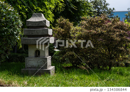 Japanese Zen Garden in Batumi. Asian Monument. Japanese garden stone lamp Japanese Zen Garden in Batumi. Asian Monument. Japanese garden stone lamp 134386844