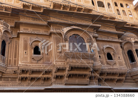 India, Facade of the Nathmal Ki Haveli, a historic mansion located in Jaisalmer. India, Facade of the Nathmal Ki Haveli, a historic mansion located in Jaisalmer. 134388660