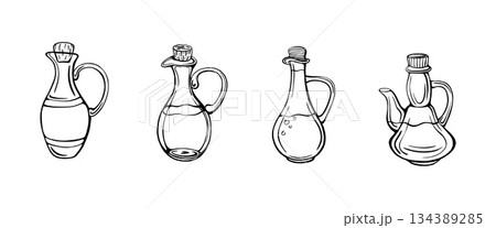set of olive oil bottles. Extra virgin oil. 134389285