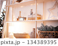 Comforting Seasonal Display Setup, Relaxing Holiday Ambiance Created By Carefully Arranged Ornaments And Lighting 134389395