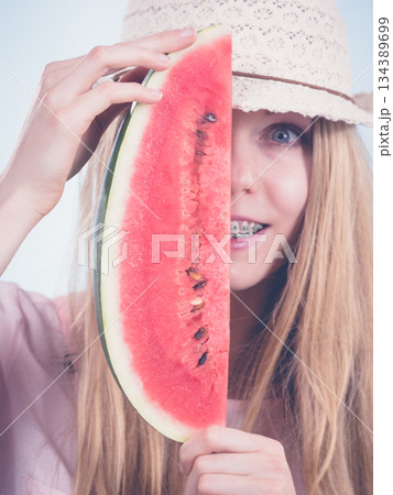 woman holding watermelon fruit woman holding watermelon fruit 134389699