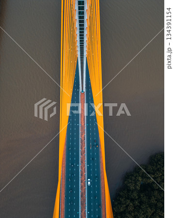 Symmetric modern cable-stayed bridge over Han river in Da Nang, Contemporary urban span connecting city across waterway 134391154