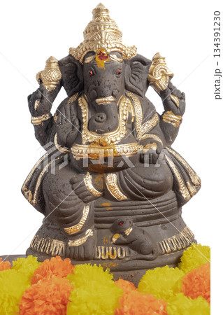 Ganesha idol with gold decoration and marigold garland for Hindu festival celebration Ganesha idol with gold decoration and marigold garland for Hindu festival celebration 134391230