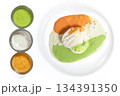 Three varieties of chutney with idli on a white plate, South Indian food 134391350