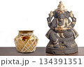 Ganesha idol with brass pot for home temple, Hindu decoration, blessings and rituals 134391351